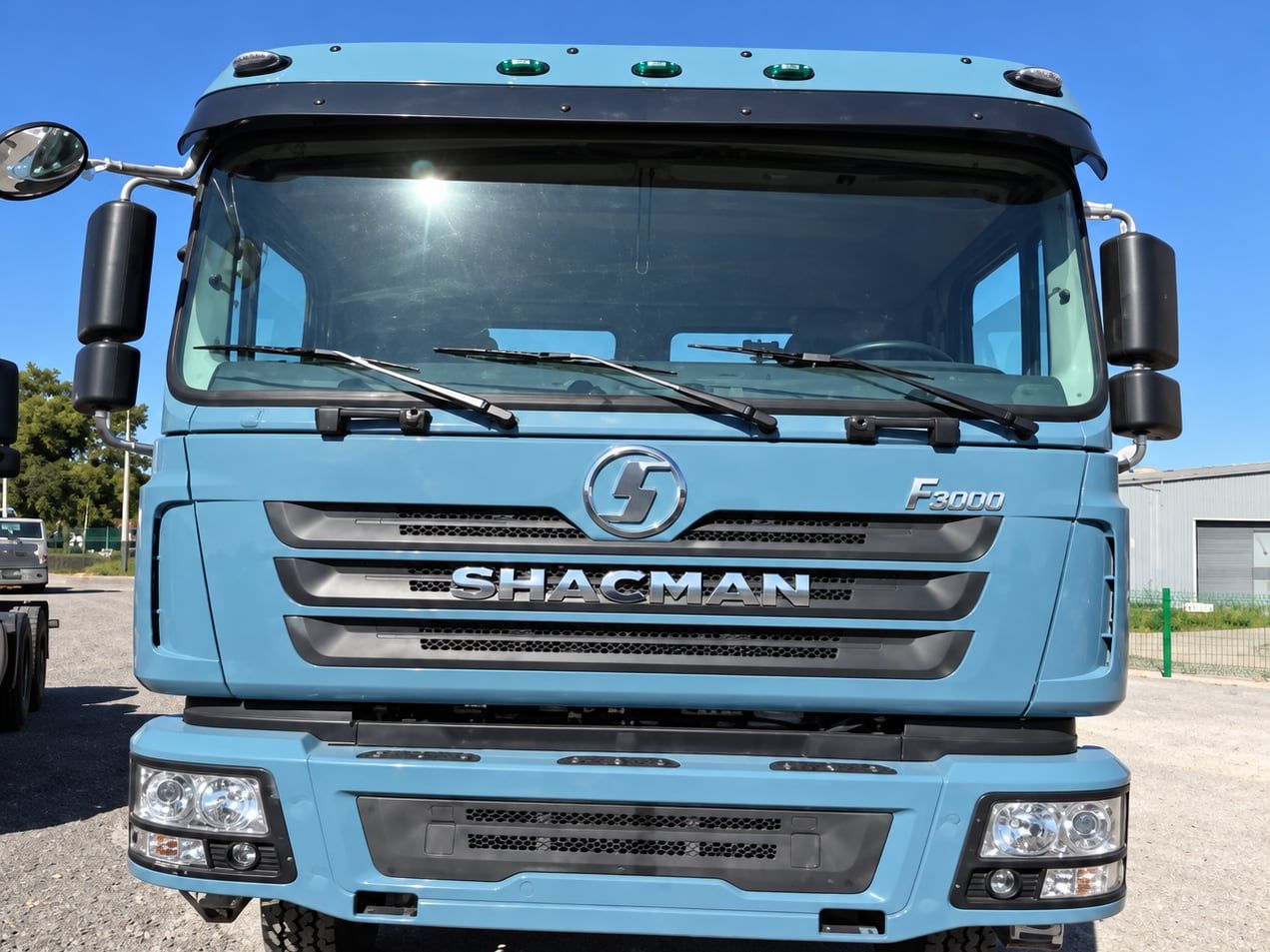 Shacman Delong F3000 6×4 Tractor Truck seen head-on, showing the full width of the cab and the F3000 badge on the grille